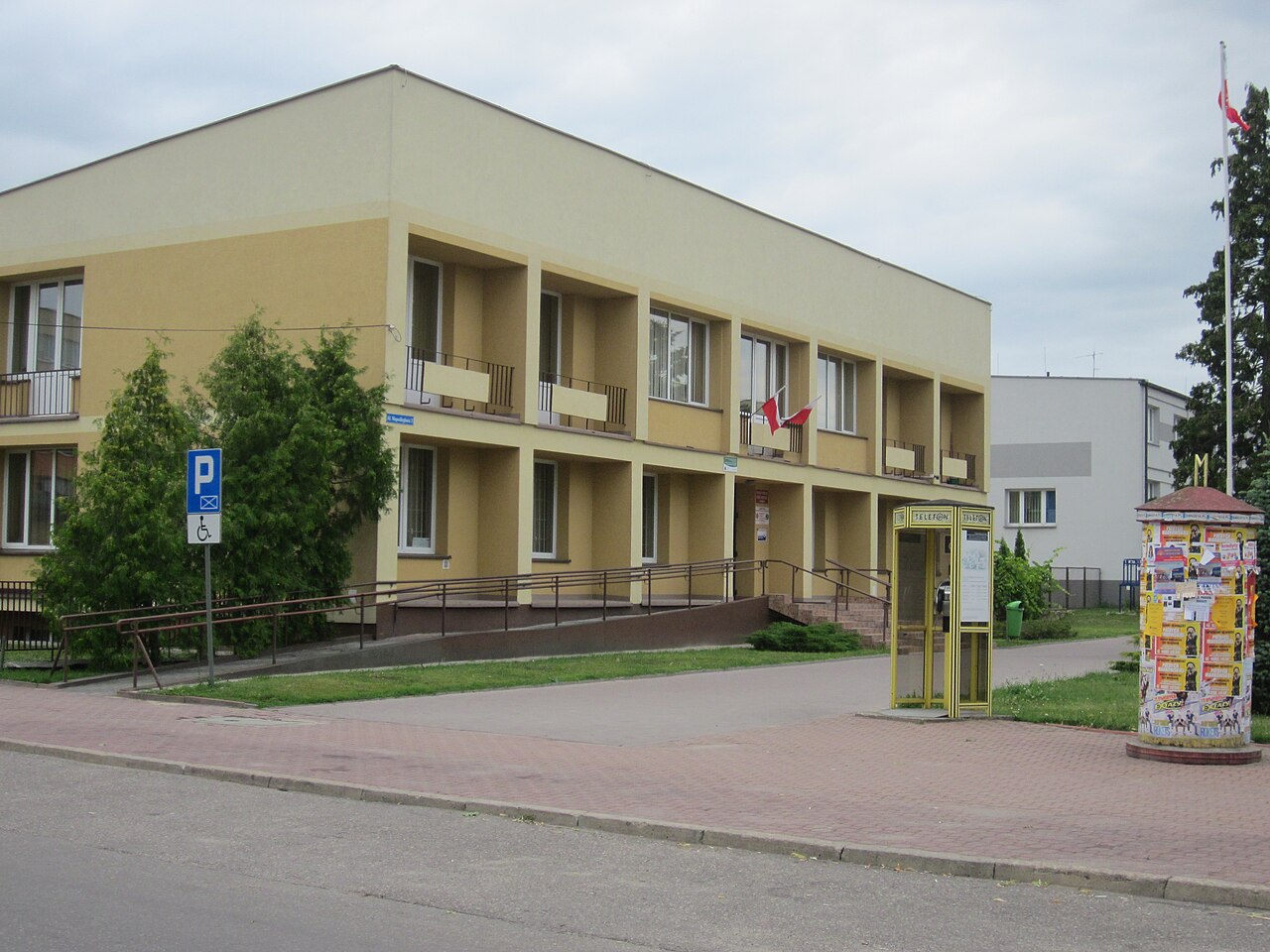 Government building with columns and a flag, symbolizing financial regulation